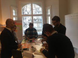 people-writing-on-desk